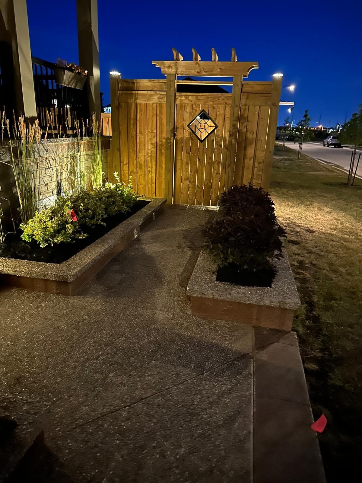 Modern cedar privacy fence and composite deck with built-in seating